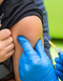 Boy being vaccinated
