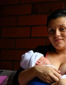 Mother holding twins