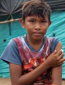 Vaccinated boy in rural community