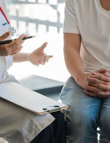 Patient talks to health care providor