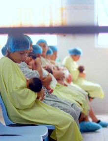 mothers breastfeeding newborns