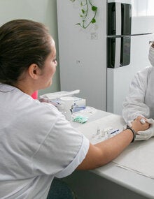 Patient interacting with health worker