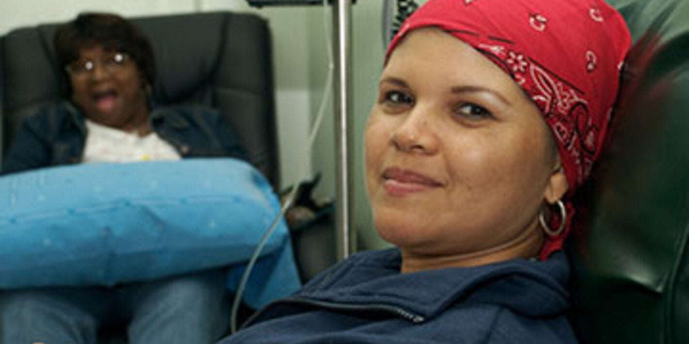 woman with bandana smiling