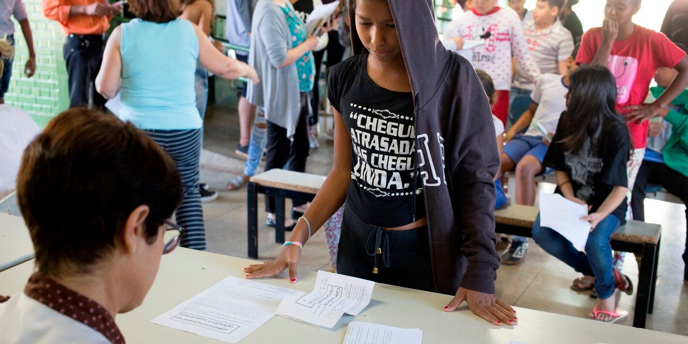 A teenager registers to receive the HPV vaccine