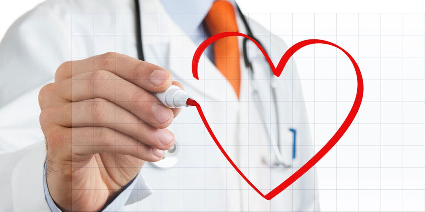 Doctor drawing heart