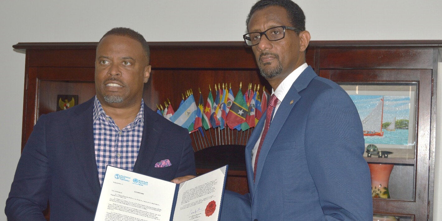 Dr Yitades Gebre (right) PAHO/WHO Representative to Barbados and the Eastern Caribbean Countries, presented his credentials to Minister Mark Brantley - Premier and Minister of Health - Nevis and Minister of Foreign Affairs, St Kitts and Nevis