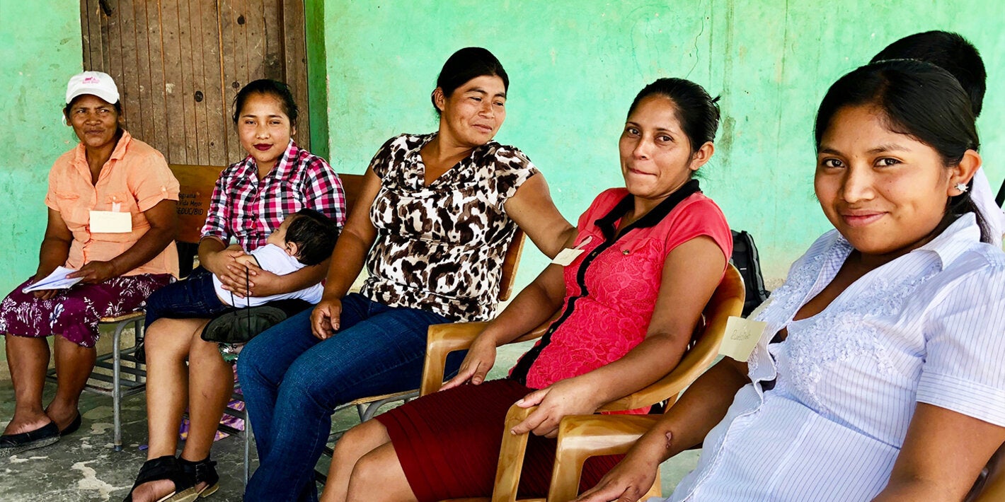Group of women sitting outdoors