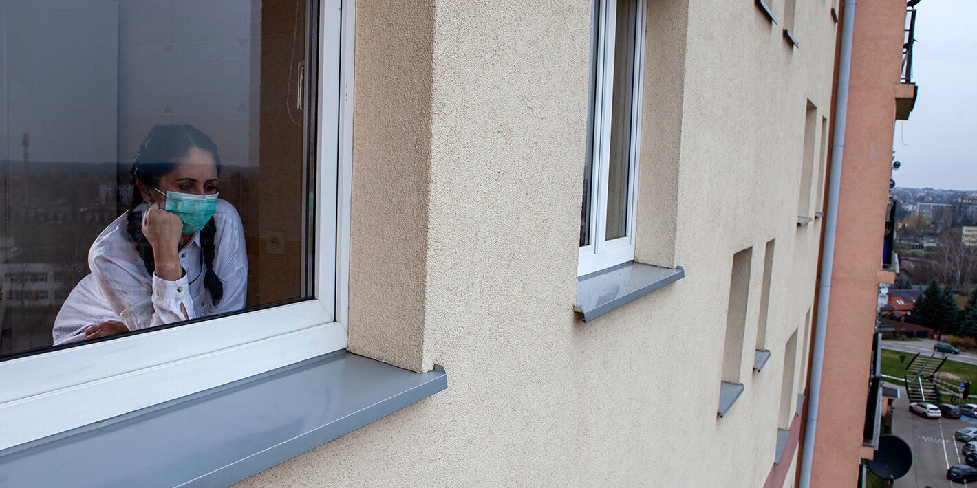 Woman looking out the window