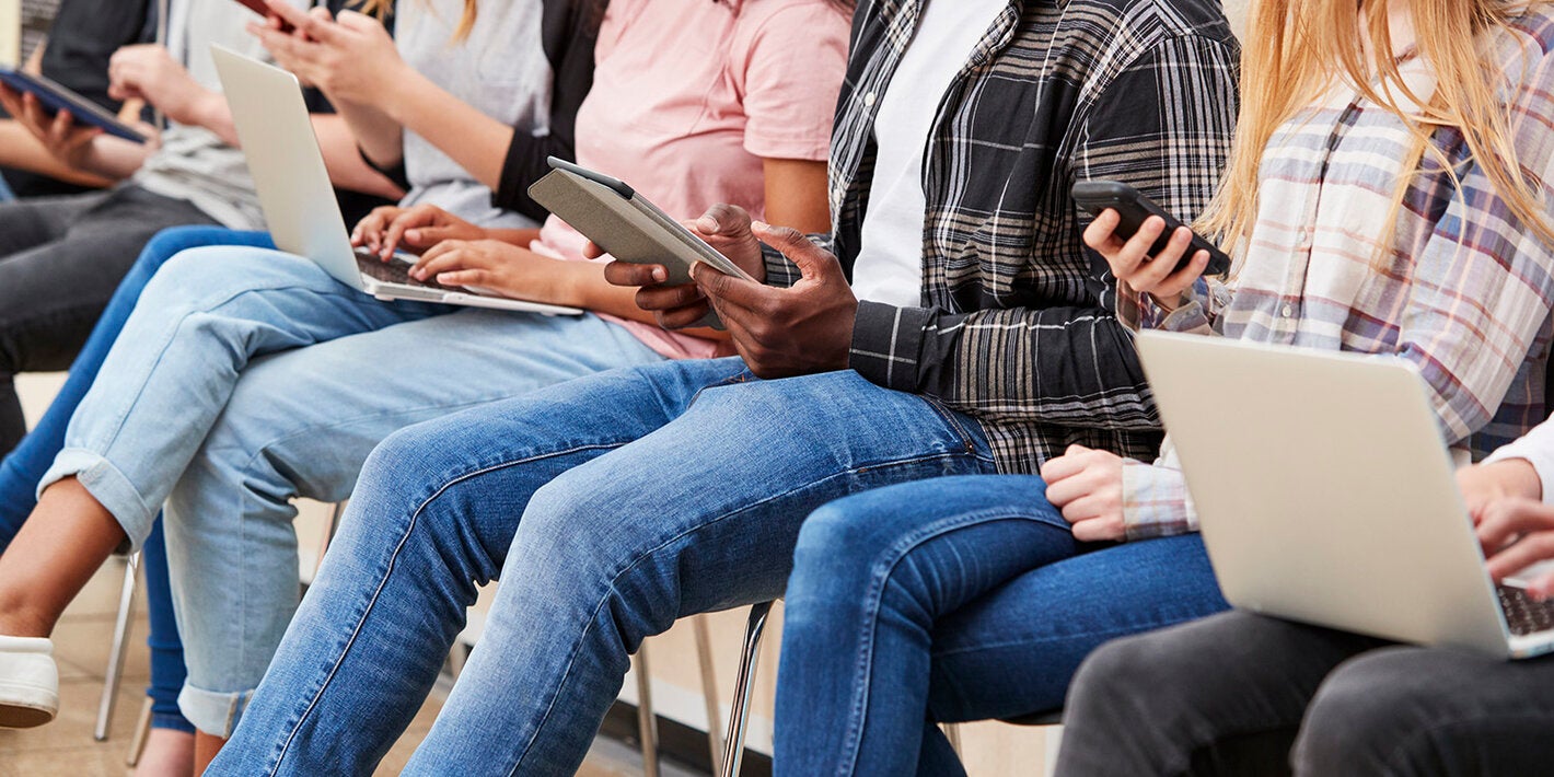 Young people on mobile devices