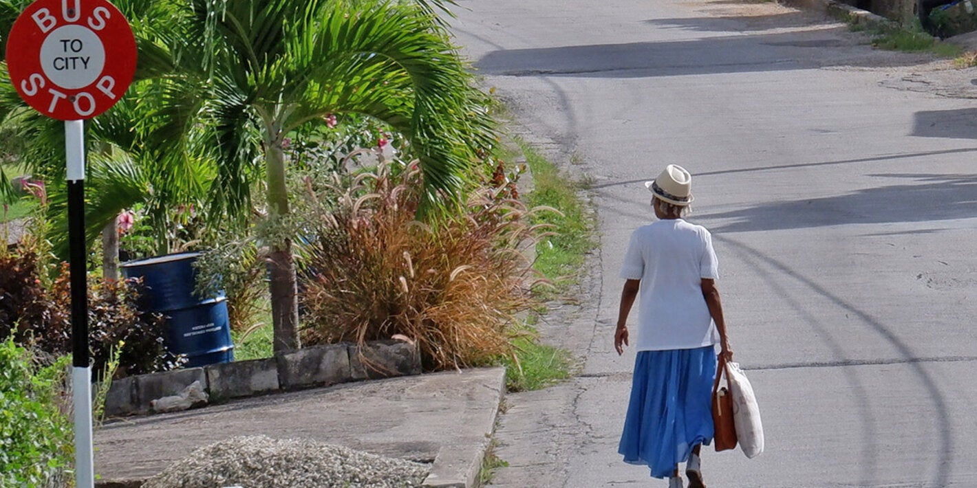 Elderly woman walking in Barbados