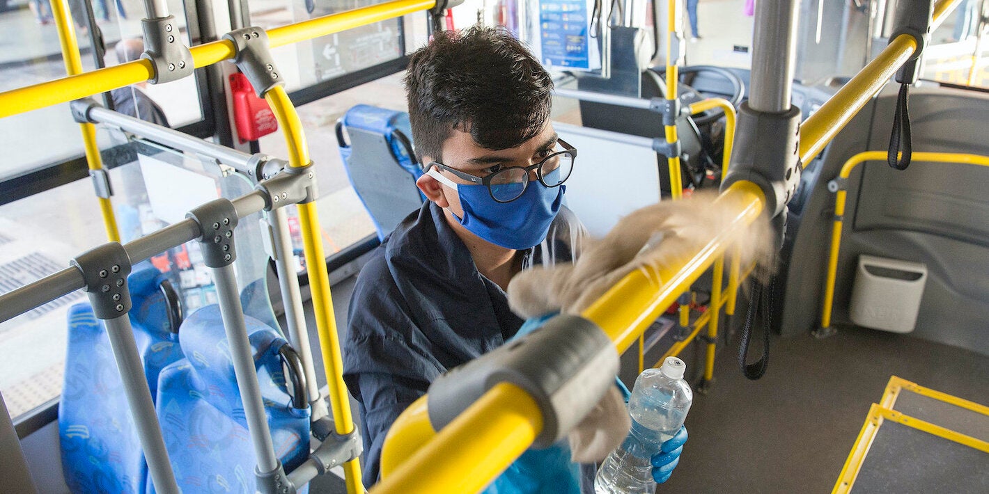 Young man riding the bus