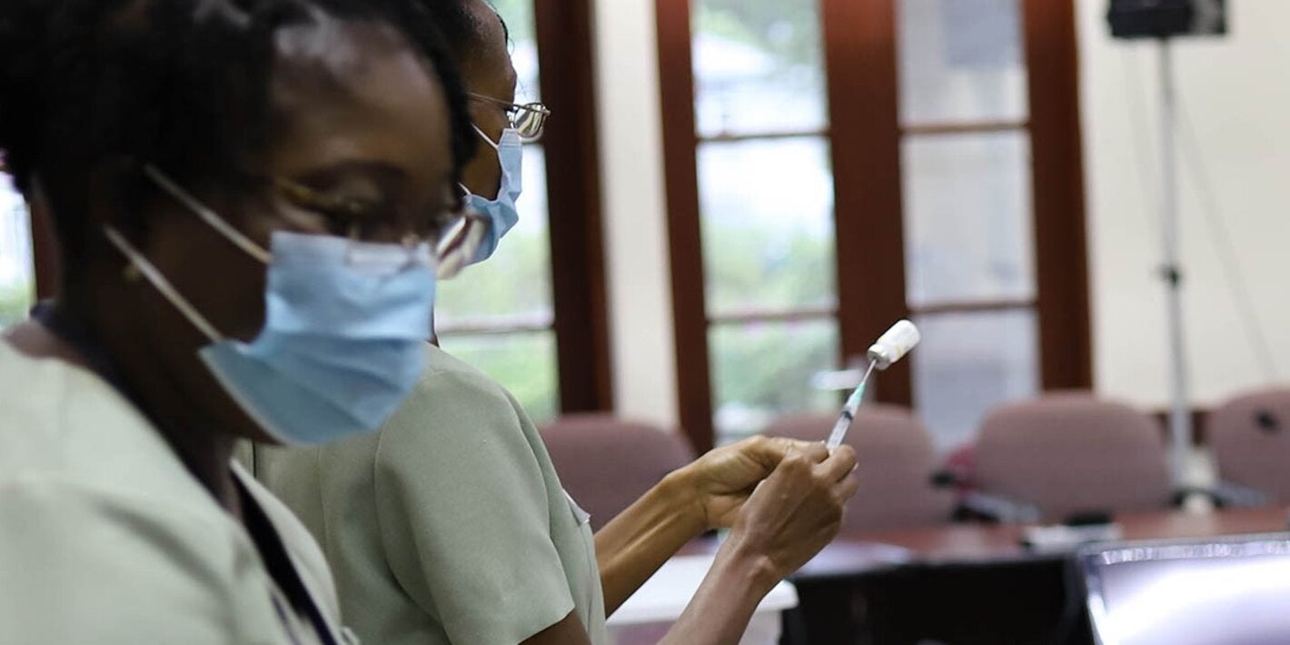 Nurse preparing influenza vaccine