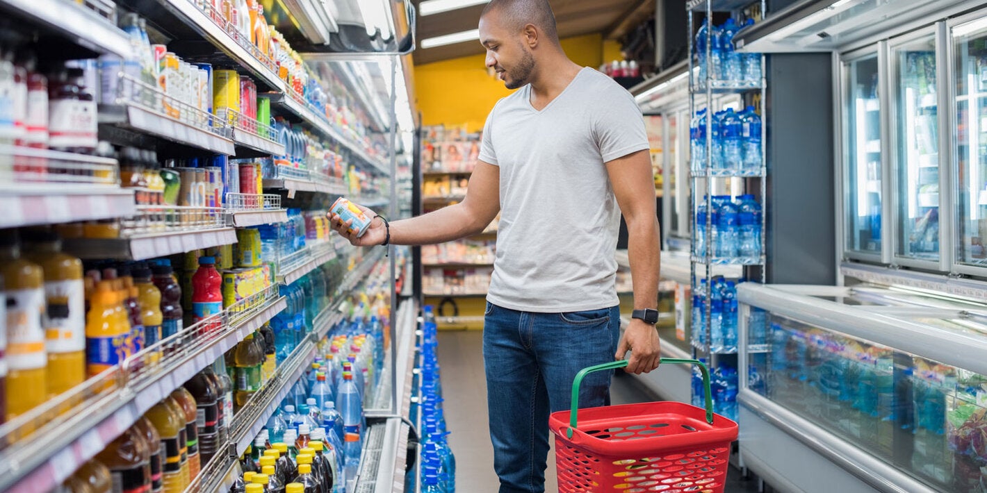 Man reads food labels