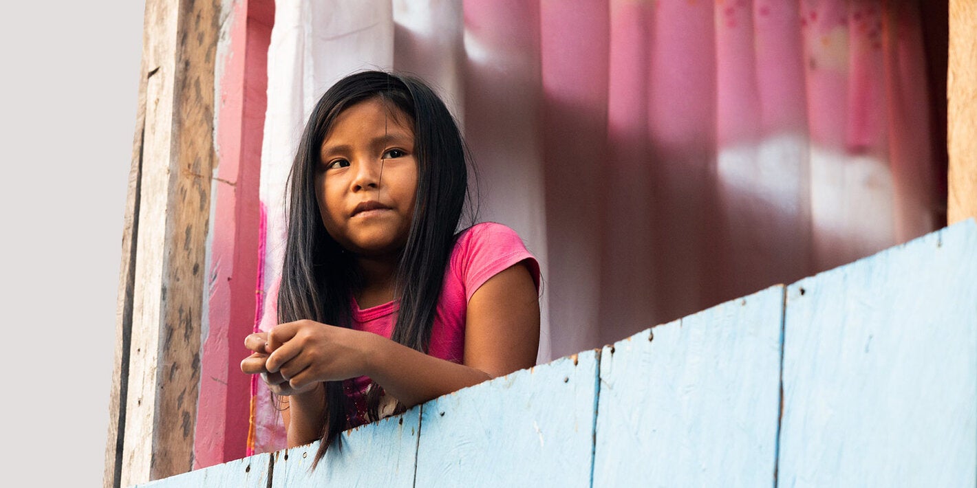 Girl looking out the window