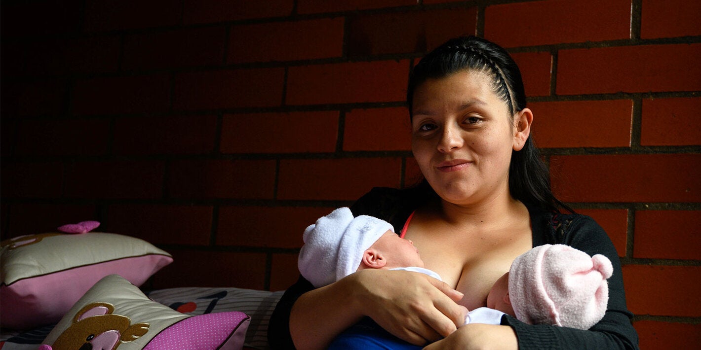 Mother holding twins