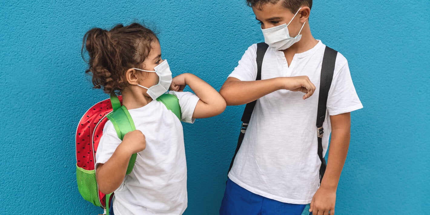 School age children wearing masks