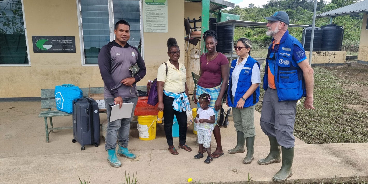 Groups photo with locals in Gakaba