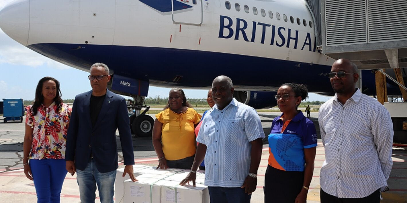 Bahamian Prime Minister Hon. Phillip Davis, Minister of Health and Wellness Dr. Michael Darville, PAHO/WHO BHS Country Representative, Dr. Eldonna Boisson and other government officials receive the first pediatric COVID-19 vaccines. 