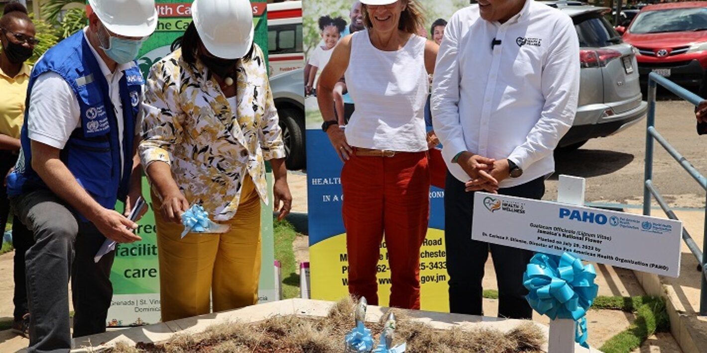 Dr. Etienne (second left) is pictured moments after planting Jamaica's national tree. Looking on (L-R) are PWR Stein, High Commissioner Judith Slater, British High Commission to Jamaica and Hon. Christopher Tufton, Minister of Health and Wellness in Jamaica