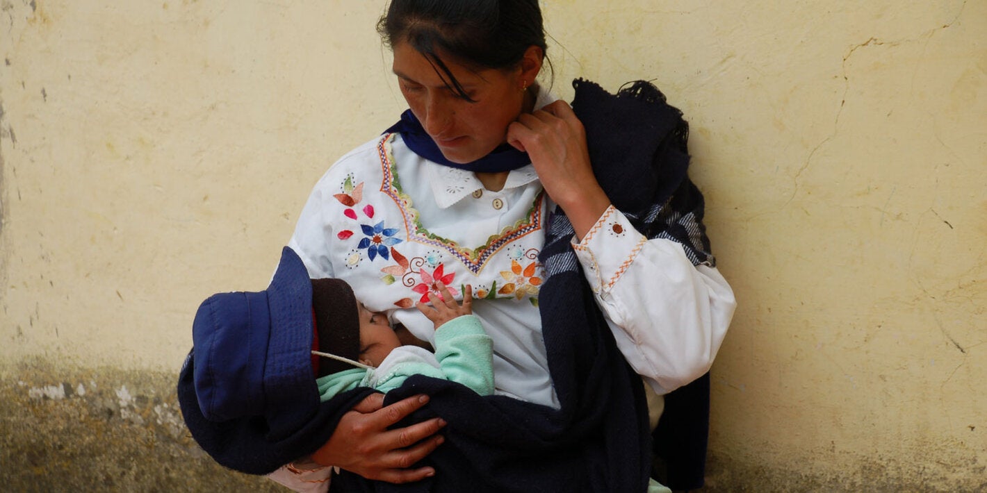 Mother breastfeeding baby