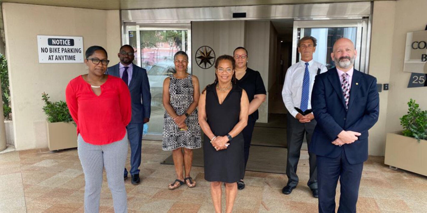 Mr Ian Stein (front right) poses with key members of the Ministry of Health