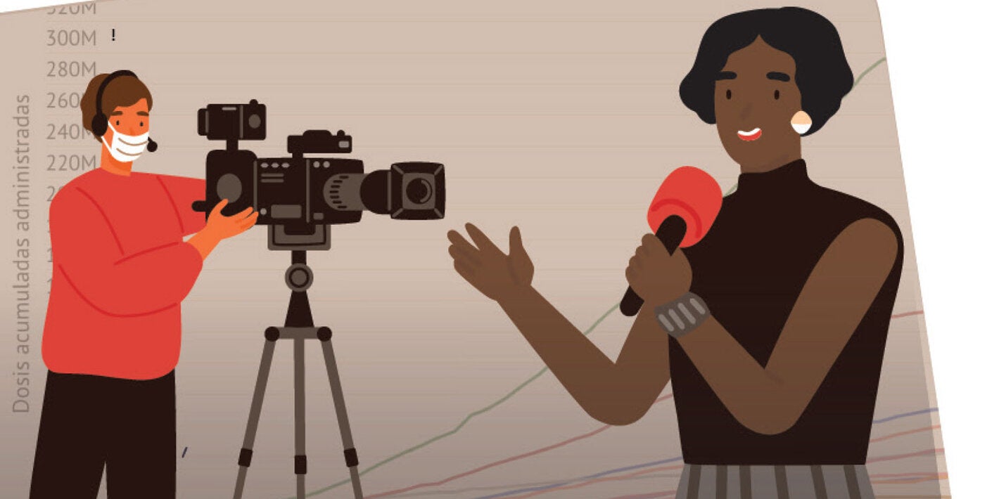 Journalistwith a microphone in hand in front of a camara