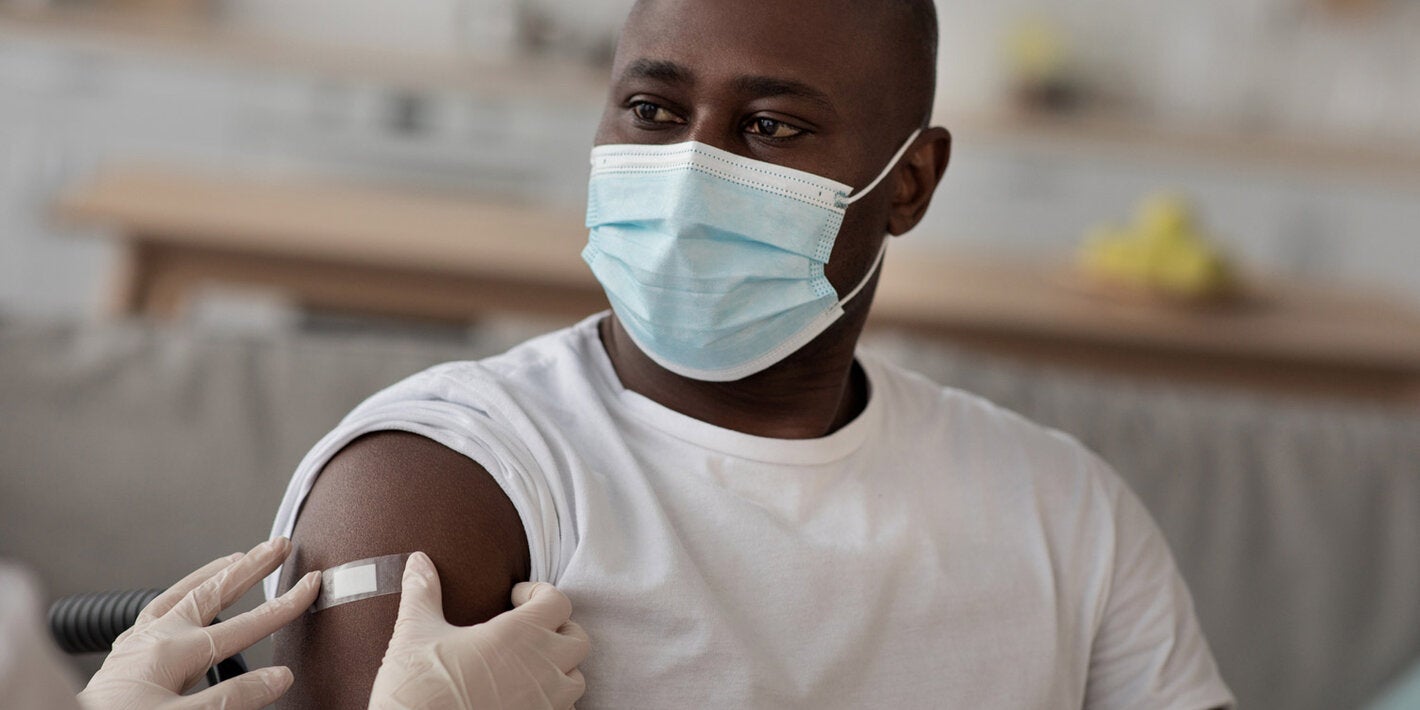 Wheel chair bound person receives vaccine