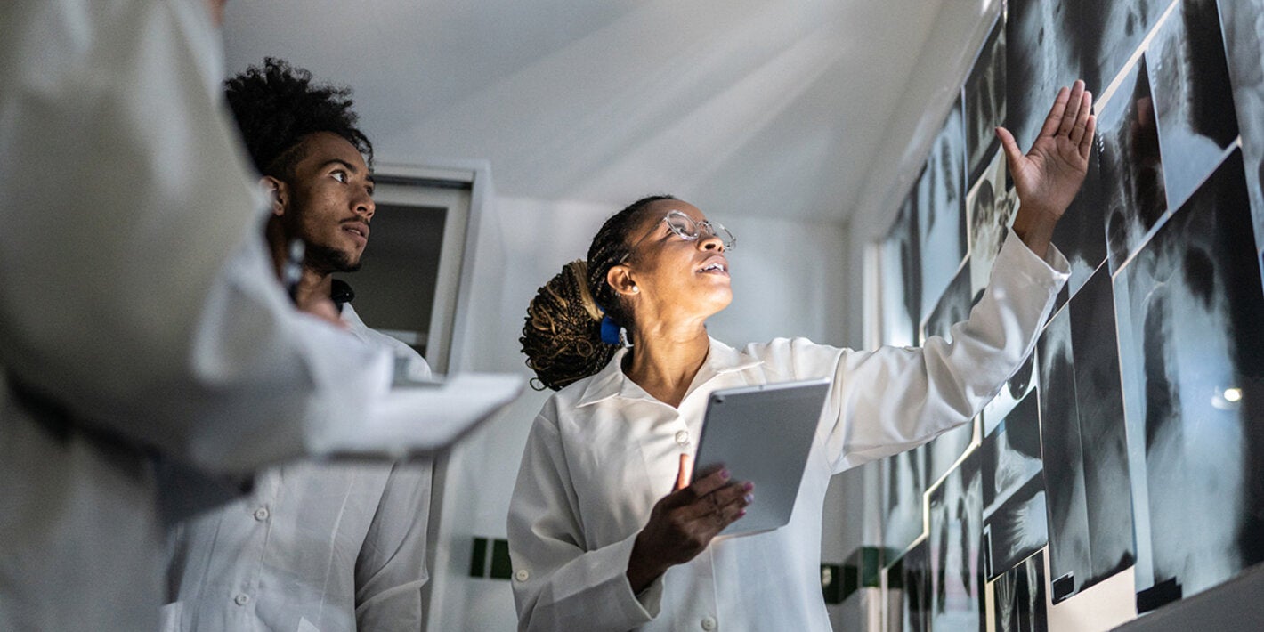 Doctors looking at xrays