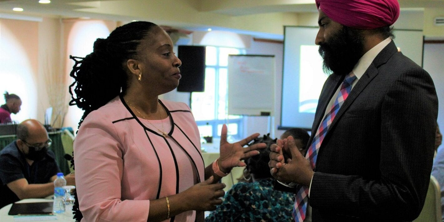 Rasheemah Cheltenham-Niles, Director Planning and Research Unit and Acting PAHO/WHO Representative for Barbados, Dr Prabjhot Singh.