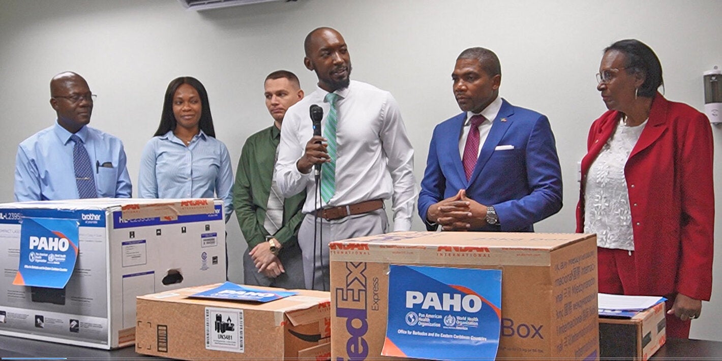 Officials at equipment donation