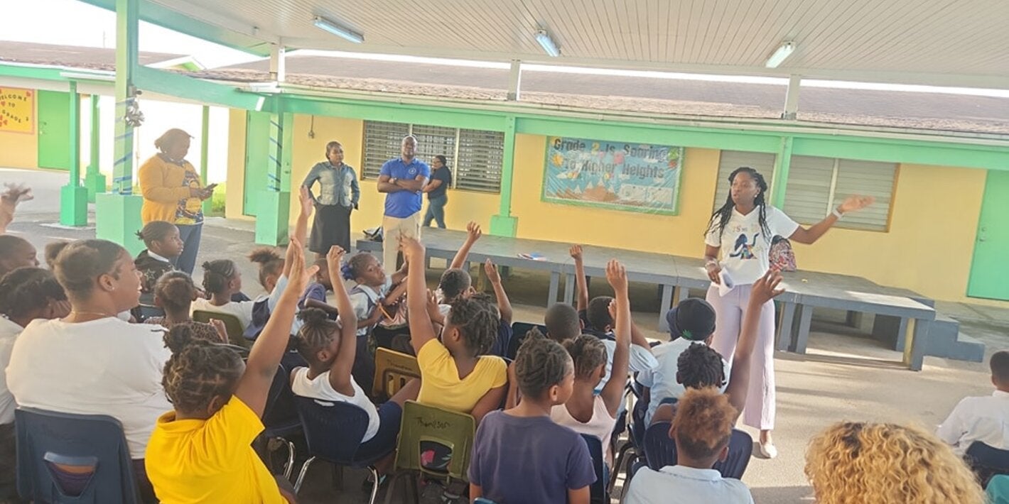 Students answering questions during World Obesity Day observance