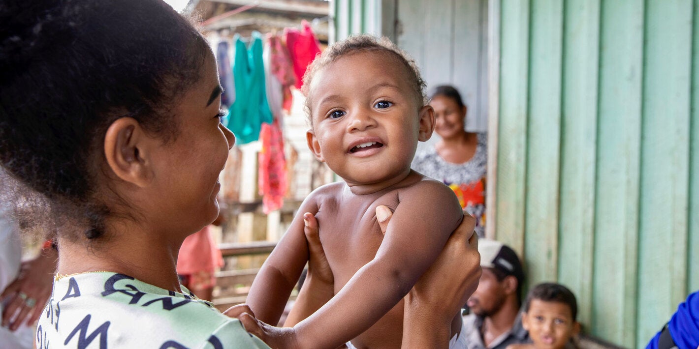 Mother and child smiling