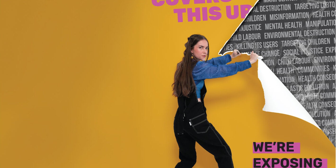 Tenn peels off wall with information on the harm of tobacco