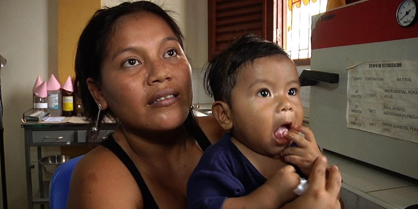 woman with toddler on her lap