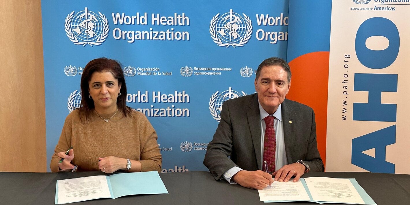 Directors of both regional offices sign the agreement