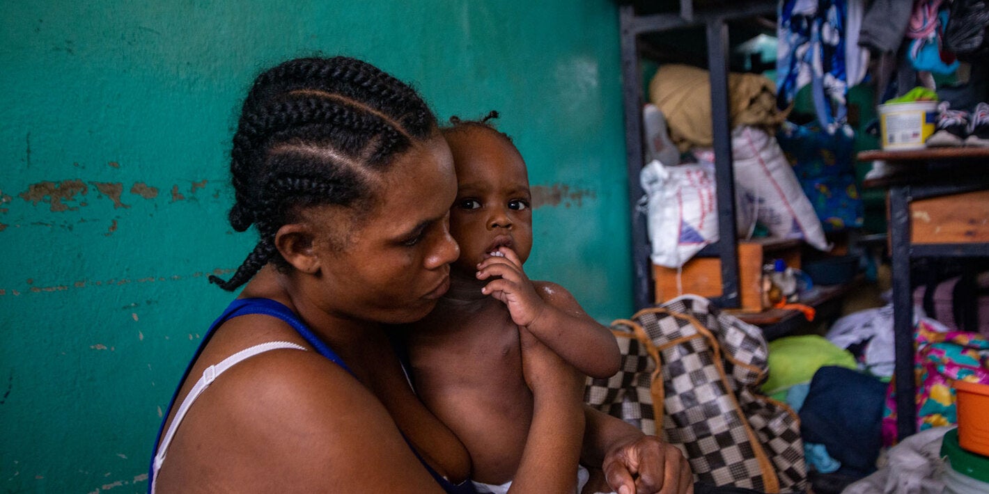 Displaced mother and child in shelter