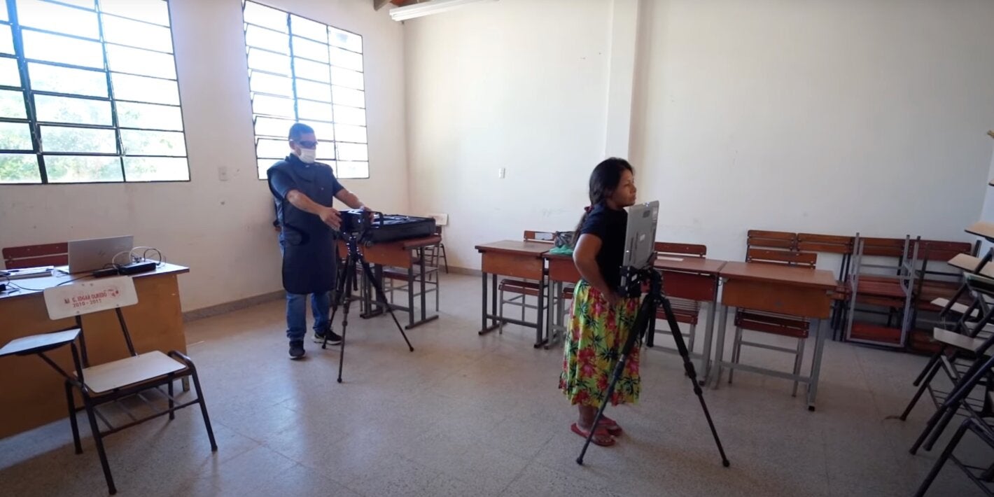 woman is examined for TB