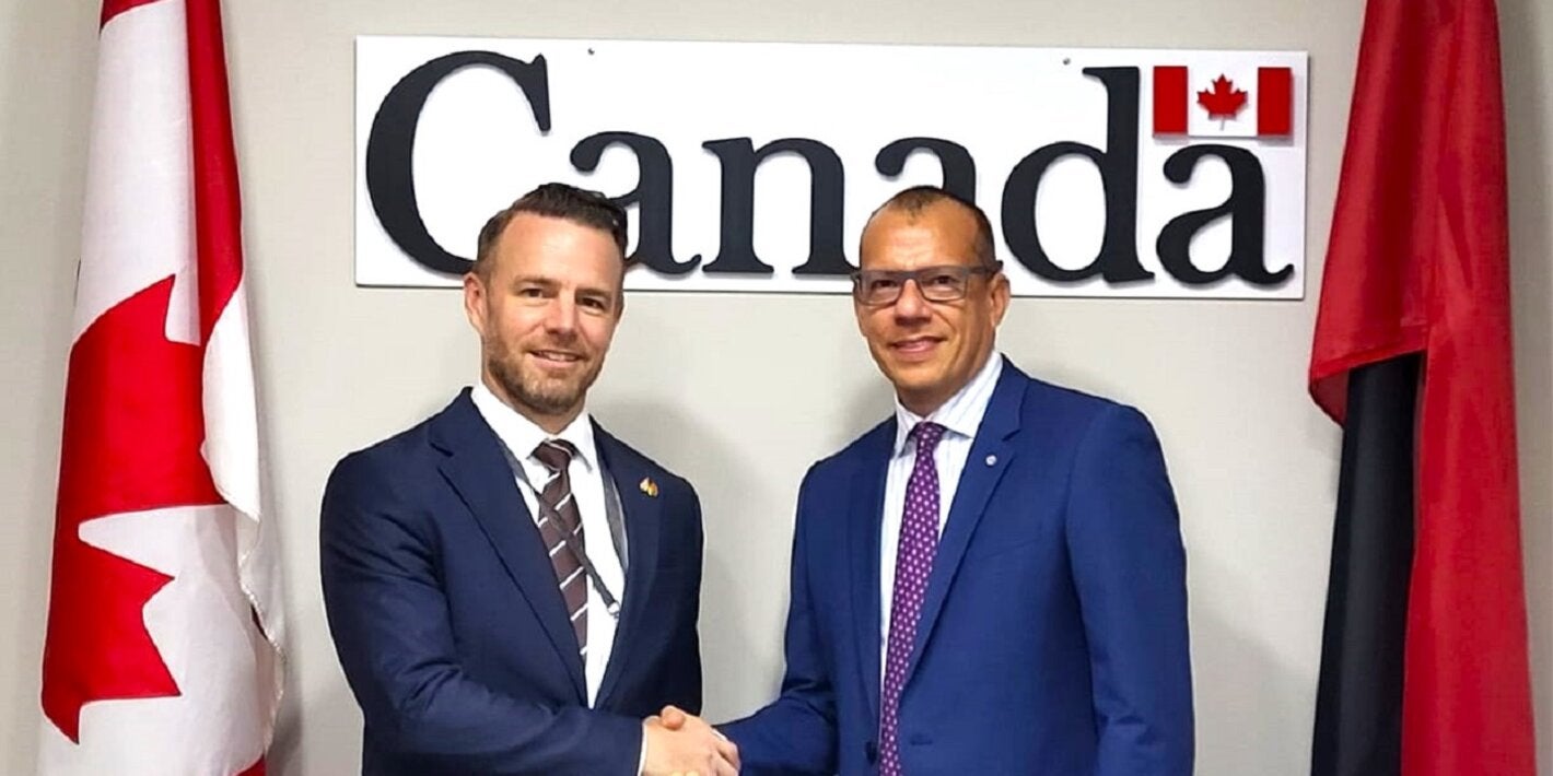 (L_R)  His Excellency Michael Callan - Canadian High Commissioner to Trinidad and Tobago , Dr. Gabriel Vivas Francesconi - PAHO/WHO Representative for Trinidad and Tobago and the Dutch Caribbean Islands