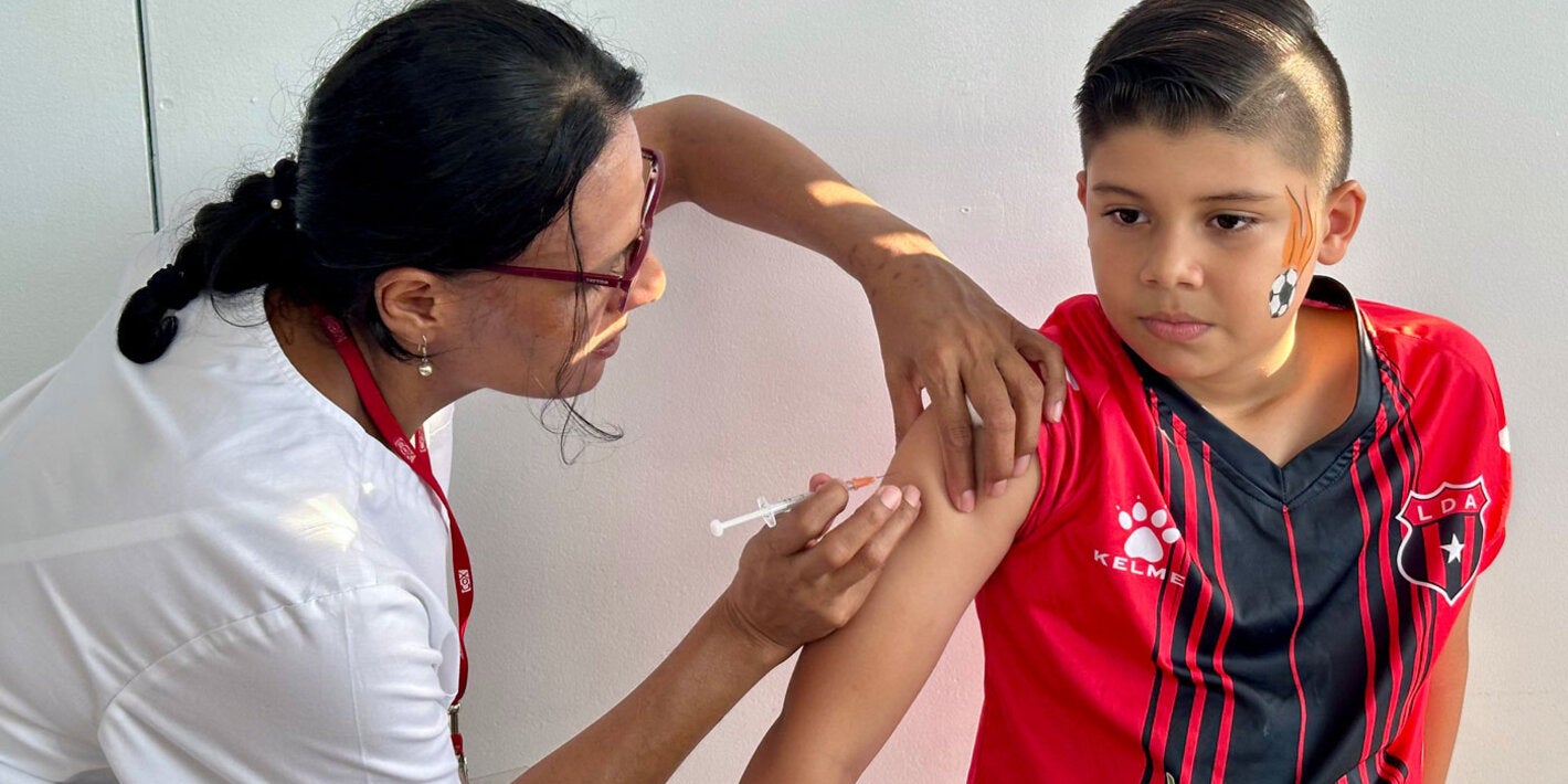 Boy receives vaccination 
