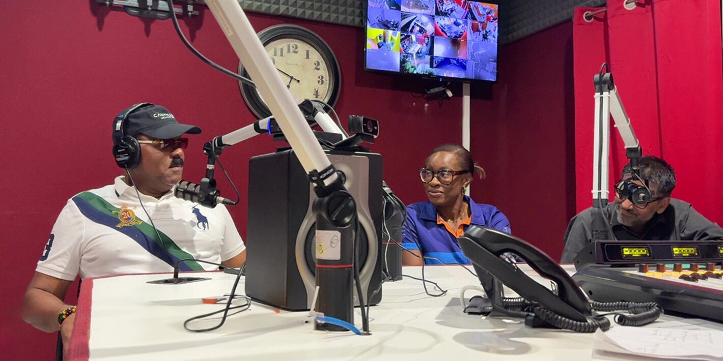 PAHO team at radio show with Prime Minister of Antigua and Barbuda