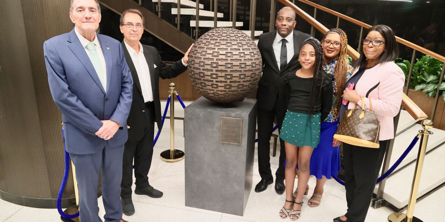 Dr. Barbosa, artist and family members of Dr. Etienne