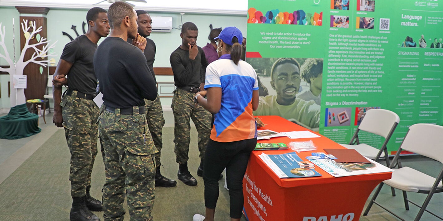 PAHO Advisor interacting with members of the Barbados Defence Force