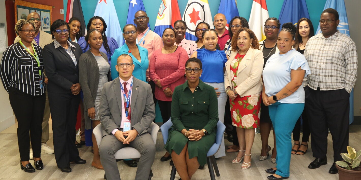PAHO Assistant Director, Dr. Rhonda Sealey-Thomas,  with the PAHO/WHO Trinidad and Tobago Country Office team