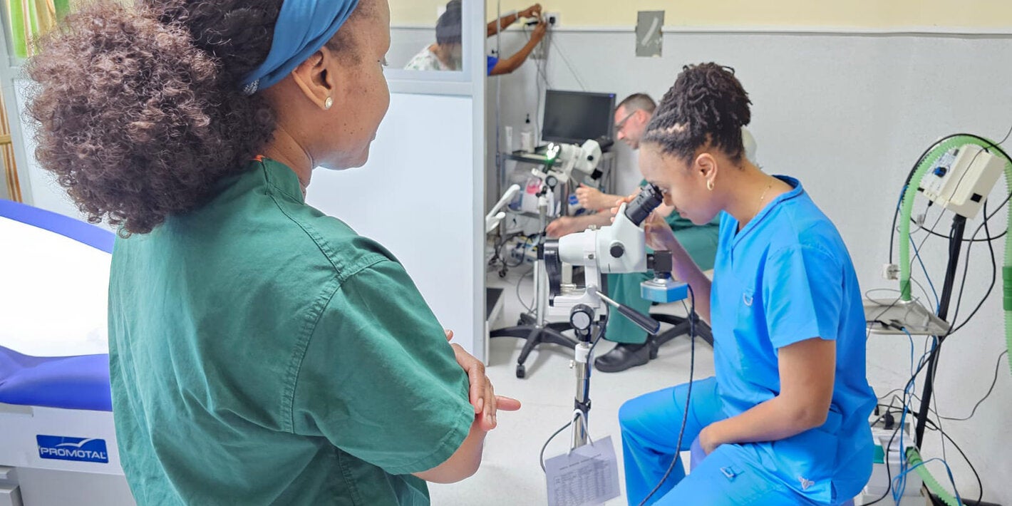 Doctors testing medical equipment