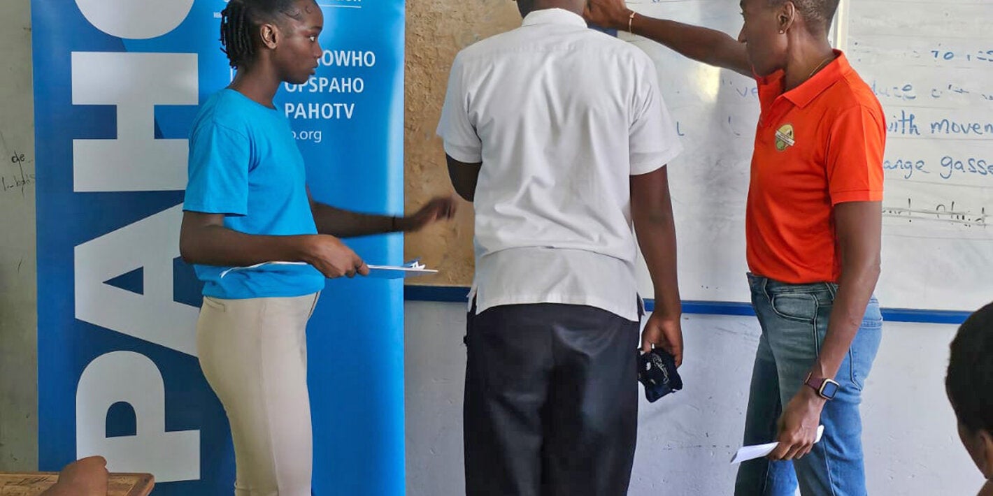 Children being weighed at Secondary School
