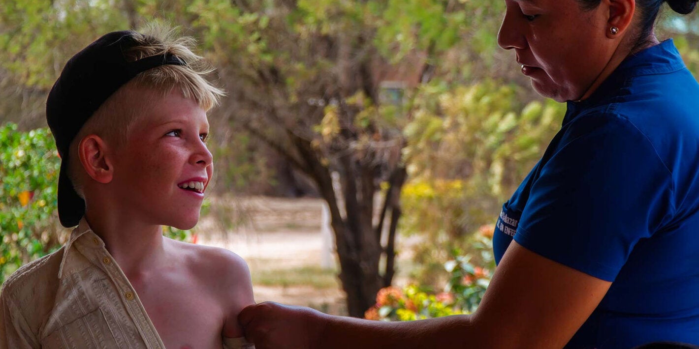 menonite boy recieves vaccination