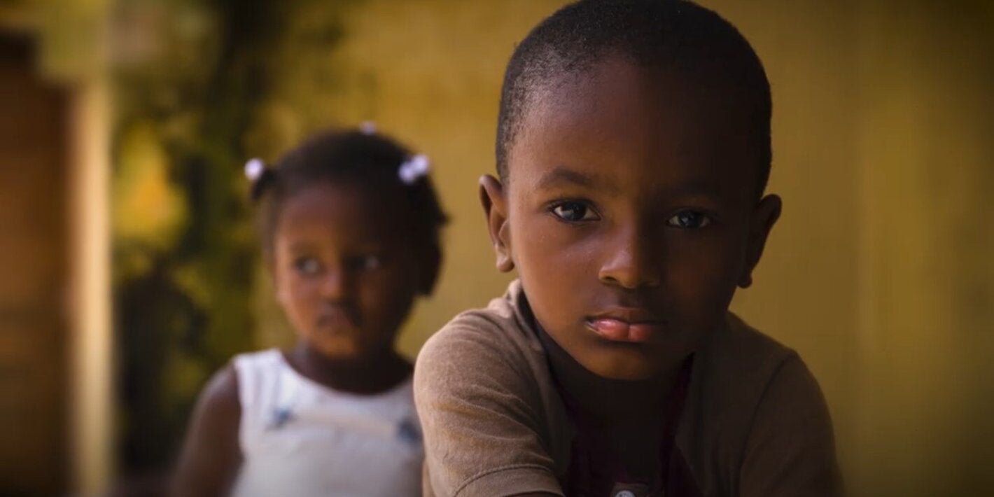 Two children looking at the camera.