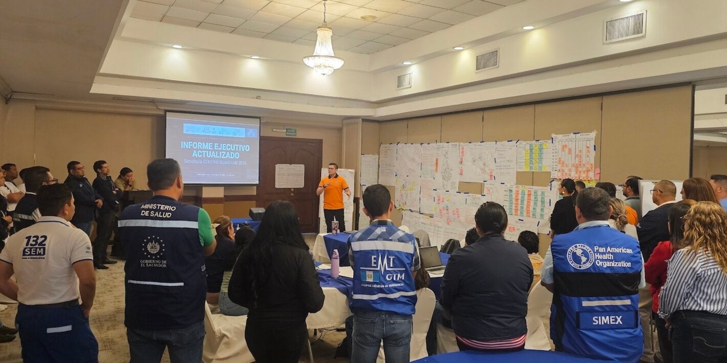 Emergency personnel in an operational briefing during a regional simulation exercise.