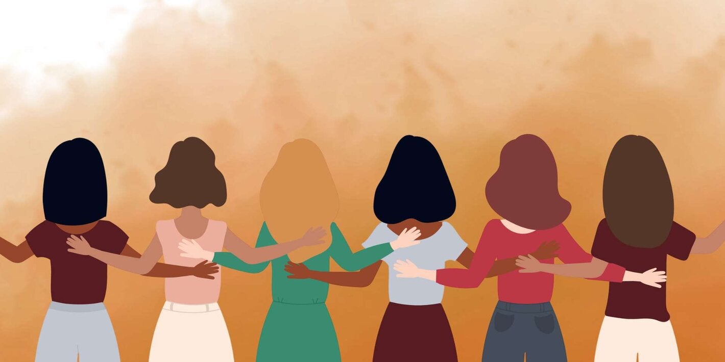 women together holding hands