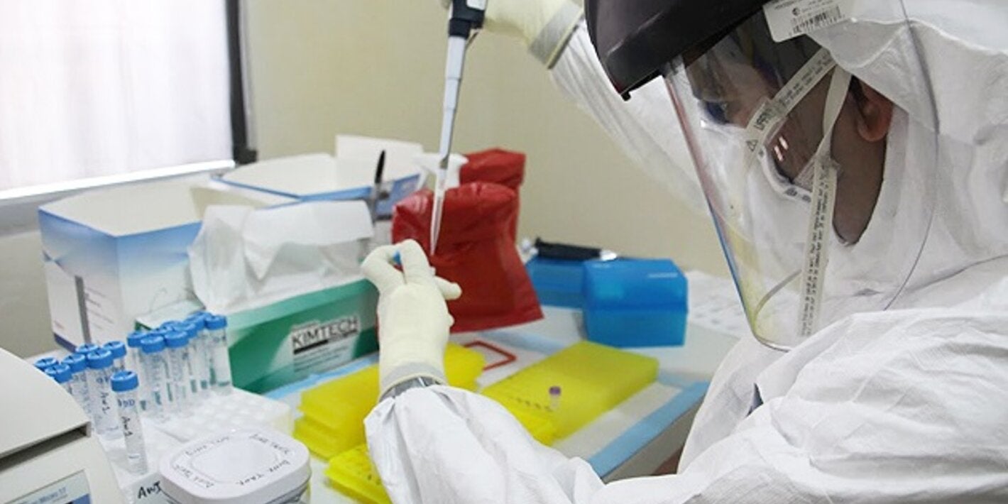 Man in lab with blood sample